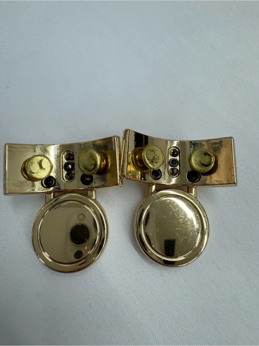 These are golden-tone replacement hardware pieces by Michael Kors .